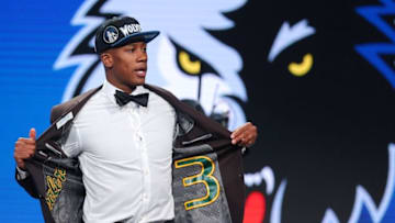 Jun 23, 2016; New York, NY, USA; Kris Dunn (Providence) shows off the inside of his coat after being selected as the number five overall pick to the Minnesota Timberwolves in the first round of the 2016 NBA Draft at Barclays Center. Mandatory Credit: Brad Penner-USA TODAY Sports