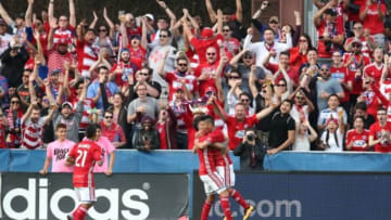 Mar 6, 2016; Dallas, TX, USA; FC Dallas forward Maximiliano Urruti (37) celebrates his second half goal with forward Mauro Diaz (10) against the Philadelphia Union at Toyota Stadium. FC Dallas beat Philadelphia Union 2-0. Mandatory Credit: Matthew Emmons-USA TODAY Sports