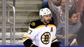 Mar 7, 2016; Sunrise, FL, USA; Boston Bruins center Patrice Bergeron (37) reacts after his goal in the first period of a game against the Florida Panthers at BB&T Center. Mandatory Credit: Robert Mayer-USA TODAY Sports