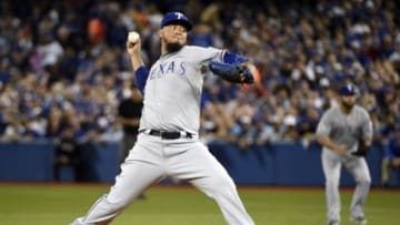 Oct 8, 2015; Toronto, Ontario, CAN; Texas Rangers starting pitcher Yovani Gallardo throws a pitch against the Toronto Blue Jays in the first inning in game one of the ALDS at Rogers Centre. Mandatory Credit: Peter Llewellyn-USA TODAY Sports