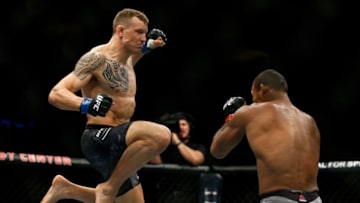 SUNRISE, FLORIDA - APRIL 27: Jack Hermansson of Sweden jumps in the air to punch Ronaldo Souza of Brazil during their middleweight bout at UFC Fight Night at BB&T Center on April 27, 2019 in Sunrise, Florida. (Photo by Michael Reaves/Getty Images)
