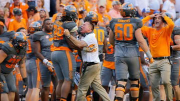 Sep 24, 2016; Knoxville, TN, USA; Tennessee Volunteers head coach Butch Jones and defensive lineman Kendal Vickers (39) during the second half against the Florida Gators at Neyland Stadium. Tennessee won 38-28. Mandatory Credit: Randy Sartin-USA TODAY Sports