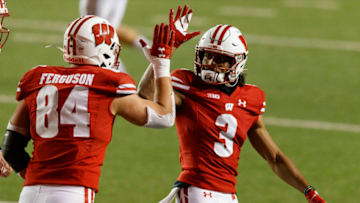 Oct 23, 2020; Madison, Wisconsin, USA; Wisconsin Badgers wide receiver Kendric Pryor (3) congratulates tight end Jake Ferguson (84) following a touchdown during the second quarter against the Illinois Fighting Illini at Camp Randall Stadium. Mandatory Credit: Jeff Hanisch-USA TODAY Sports