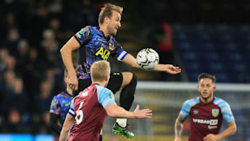 Tottenham Hotspur's English striker Harry Kane jumps to control the ball during the English League Cup round of 16 football match between Burnley and Tottenham Hotspur at Turf Moor in Burnley, north-west England on October 27, 2021. - - RESTRICTED TO EDITORIAL USE. No use with unauthorized audio, video, data, fixture lists, club/league logos or 'live' services. Online in-match use limited to 120 images. An additional 40 images may be used in extra time. No video emulation. Social media in-match use limited to 120 images. An additional 40 images may be used in extra time. No use in betting publications, games or single club/league/player publications. (Photo by Lindsey Parnaby / AFP) / RESTRICTED TO EDITORIAL USE. No use with unauthorized audio, video, data, fixture lists, club/league logos or 'live' services. Online in-match use limited to 120 images. An additional 40 images may be used in extra time. No video emulation. Social media in-match use limited to 120 images. An additional 40 images may be used in extra time. No use in betting publications, games or single club/league/player publications. / RESTRICTED TO EDITORIAL USE. No use with unauthorized audio, video, data, fixture lists, club/league logos or 'live' services. Online in-match use limited to 120 images. An additional 40 images may be used in extra time. No video emulation. Social media in-match use limited to 120 images. An additional 40 images may be used in extra time. No use in betting publications, games or single club/league/player publications. (Photo by LINDSEY PARNABY/AFP via Getty Images)