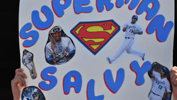 Jun 19, 2016; Kansas City, MO, USA; A fan of Kansas City Royals catcher Salvador Perez (not pictured) holds a sign from the stands during the eleventh inning against the Detroit Tigers at Kauffman Stadium. The Royals won 2-1. Mandatory Credit: Denny Medley-USA TODAY Sports