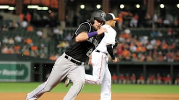 Jul 25, 2016; Baltimore, MD, USA; Colorado Rockies outfielder David Dahl (26) rounds third base while scoring a run in the seventh inning against the Baltimore Orioles at Oriole Park at Camden Yards. Mandatory Credit: Evan Habeeb-USA TODAY Sports