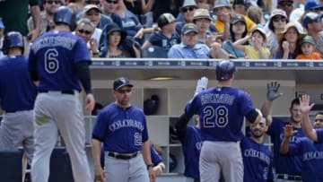 May 3, 2015; San Diego, CA, USA; Colorado Rockies third baseman Nolan Arenado (28) celebrates with teammates after hitting a two run home run during the fifth inning against the San Diego Padres at Petco Park. Mandatory Credit: Jake Roth-USA TODAY Sports