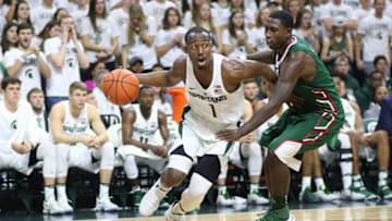 EAST LANSING, MI - NOVEMBER 18: Joshua Langford #1 of the Michigan State Spartans drives to the basket against Vacha Vaughn #0 of the Mississippi Valley State Delta Devils at the Breslin Center on November 18, 2016 in East Lansing, Michigan. (Photo by Rey Del Rio/Getty Images)