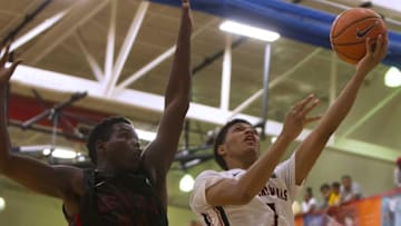 Jul 10, 2016; North Augusta, SC, USA; PSA Cardinals Quade Green (1) goes up for the layup defended by Mokan Elite Carte