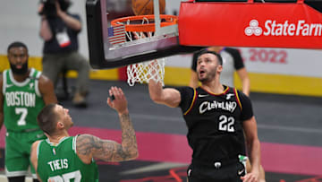 CLEVELAND, OHIO - MARCH 17: Larry Nance Jr. #22 of the Cleveland Cavaliers shoots over Daniel Theis #27 of the Boston Celtics during the third quarter at Rocket Mortgage Fieldhouse on March 17, 2021 in Cleveland, Ohio. NOTE TO USER: User expressly acknowledges and agrees that, by downloading and/or using this photograph, user is consenting to the terms and conditions of the Getty Images License Agreement. (Photo by Jason Miller/Getty Images)