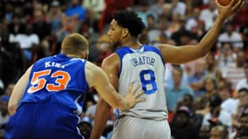 Jul 14, 2015; Las Vegas, NV, USA; Philadelphia 76ers center Jahlil Okafor (8) holds the ball away from New York Knicks forward Alex Kirk (53) during an NBA Summer League game at Thomas & Mack Center. Mandatory Credit: Stephen R. Sylvanie-USA TODAY Sports