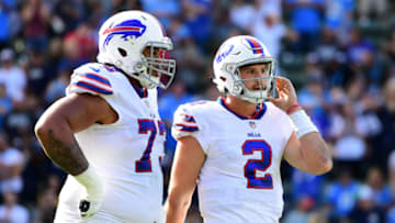 CARSON, CA - NOVEMBER 19: Nathan Peterman No. 2 of the Buffalo Bills reacts alongside Dion Dawkins No. 73 of the Buffalo Bills after throwing his second interception during the game against the Los Angeles Chargers at the StubHub Center on November 19, 2017 in Carson, California. (Photo by Harry How/Getty Images)