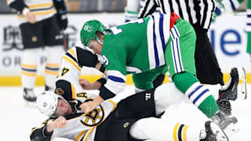 BOSTON, MASSACHUSETTS - MARCH 05: Micheal Ferland #79 of the Carolina Hurricanes and David Backes #42 of the Boston Bruins fight during the first period at TD Garden on March 05, 2019 in Boston, Massachusetts. (Photo by Maddie Meyer/Getty Images)