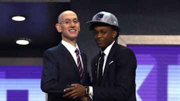 NEW YORK, NY - JUNE 22: DeAaron Fox walks on stage with NBA commissioner Adam Silver after being drafted fifth overall by the Sacramento Kings during the first round of the 2017 NBA Draft at Barclays Center on June 22, 2017 in New York City. NOTE TO USER: User expressly acknowledges and agrees that, by downloading and or using this photograph, User is consenting to the terms and conditions of the Getty Images License Agreement. (Photo by Mike Stobe/Getty Images)