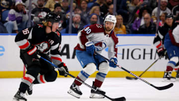 Oct 29, 2023; Buffalo, New York, USA; Colorado Avalanche left wing Tomas Tatar (90) defends as Buffalo Sabres defenseman Rasmus Dahlin (26) carries the puck during the first period at KeyBank Center. Mandatory Credit: Timothy T. Ludwig-USA TODAY Sports