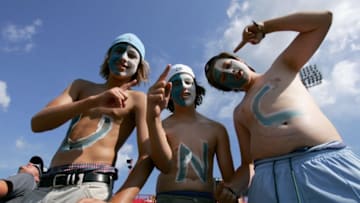 OMAHA, NE - JUNE 25: Young fans show their support for the North Carolina Tar Heels as they prepare to face the Oregon State Beavers in Game 2 of the NCAA College World Series Baseball Championship at Rosenblatt Stadium on June 25, 2006 in Omaha, Nebraska. (Photo by Doug Pensinger/Getty Images)