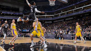 SACRAMENTO, CA - DECEMBER 27: De'Aaron Fox #5 of the Sacramento Kings dunks the ball during the game against the Los Angeles Lakers on December 27, 2018 at Golden 1 Center in Sacramento, California. NOTE TO USER: User expressly acknowledges and agrees that, by downloading and or using this Photograph, user is consenting to the terms and conditions of the Getty Images License Agreement. Mandatory Copyright Notice: Copyright 2018 NBAE (Photo by Rocky Widner/NBAE via Getty Images)