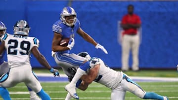 DETROIT, MI - OCTOBER 08: Wide receiver Marvin Jones #11 of the Detroit Lions is stopped by the Carolina Panthers during first half at Ford Field on October 8, 2017 in Detroit, Michigan. (Photo by Gregory Shamus/Getty Images)