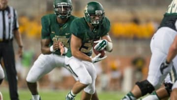 Sep 6, 2014; Waco, TX, USA; Baylor Bears quarterback Chris Johnson (13) and running back Silas Nacita (31) during the game against the Northwestern State Demons at McLane Stadium. The Bears defeated the Demons 70-6. Mandatory Credit: Jerome Miron-USA TODAY Sports
