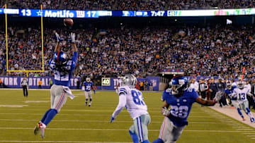 Oct 25, 2015; East Rutherford, NJ, USA; New York Giants strong safety Brandon Meriweather (22) intercepts a pass intended for Dallas Cowboys wide receiver Terrance Williams (83) during the NFL game at MetLife Stadium. Mandatory Credit: Robert Deutsch-USA TODAY Sports