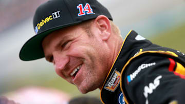 TALLADEGA, ALABAMA - OCTOBER 12: Clint Bowyer, driver of the #14 Rush/Mobil Delvac 1 Ford, stands on the grid during qualifying for the Monster Energy NASCAR Cup Series 1000Bulbs.com 500 at Talladega Superspeedway on October 12, 2019 in Talladega, Alabama. (Photo by Sean Gardner/Getty Images)