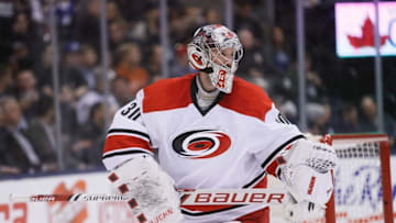 Feb 25, 2016; Toronto, Ontario, CAN; Carolina Hurricanes goaltender Cam Ward (30) during a break in the action against the Toronto Maple Leafs during the second period at the Air Canada Centre. Mandatory Credit: John E. Sokolowski-USA TODAY Sports