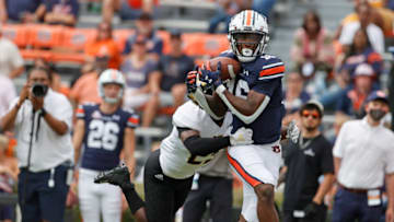 Auburn footballSep 11, 2021; Auburn, Alabama, USA; Auburn Tigers wide receiver Malcolm Johnson Jr. (16) makes a catch as Alabama State Hornets defensive back Rodney Echols (25) defends during the third quarter at Jordan-Hare Stadium. Mandatory Credit: John Reed-USA TODAY Sports