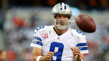 Oct 6, 2013; Arlington, TX, USA; Dallas Cowboys quarterback Tony Romo (9) catches a ball during warmups before the game Denver Broncos at AT&T Stadium. Photo Credit: USA Today Sports