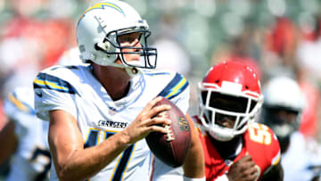 CARSON, CA - SEPTEMBER 09: Philip Rivers #17 of the Los Angeles Chargers scrambles out of the pocket from Dee Ford #55 of the Kansas City Chiefs during the second half at StubHub Center on September 9, 2018 in Carson, California. (Photo by Harry How/Getty Images)