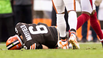 Oct 17, 2021; Cleveland, Ohio, USA; Cleveland Browns quarterback Baker Mayfield (6) lays on the ground from an injury during the third quarter against the Arizona Cardinals at FirstEnergy Stadium. Mandatory Credit: Scott Galvin-USA TODAY Sports