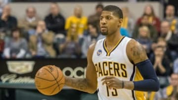 Jan 12, 2016; Indianapolis, IN, USA; Indiana Pacers forward Paul George (13) dribbles the ball in the second half of the game against the Phoenix Suns at Bankers Life Fieldhouse. The Indiana Pacers beat the Phoenix Suns by the score of 116-97. Mandatory Credit: Trevor Ruszkowski-USA TODAY Sports
