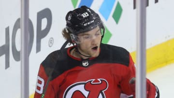 Oct 26, 2021; Newark, New Jersey, USA; New Jersey Devils center Dawson Mercer (18) celebrates his goal during the third period of their game against the Calgary Flames at Prudential Center. Mandatory Credit: Ed Mulholland-USA TODAY Sports