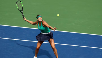 NEW HAVEN, CT - AUGUST 25: Aryna Sabaleka of Belarus returns a shot to Carla Suarez Navarro of Spain during the Singles Final during Day 6 of the Connecticut Open at Connecticut Tennis Center at Yale on August 25, 2018 in New Haven, Connecticut. (Photo by Maddie Meyer/Getty Images)