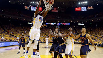 Jun 5, 2016; Oakland, CA, USA; Golden State Warriors center Festus Ezeli (31) dunks the ball agsint Cleveland Cavaliers guard J.R. Smith (5) during the first quarter in game two of the NBA Finals at Oracle Arena. Mandatory Credit: Ezra Shaw-Pool Photo via USA TODAY Sports