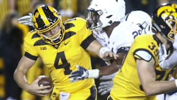 IOWA CITY, IOWA- OCTOBER 12: Quarterback Nate Stanley #4 of the Iowa Hawkeyes is sacked during the first half by defensive end Jayson Oweh #28 of the Penn State Nittany Lions on October 12, 2019 at Kinnick Stadium in Iowa City, Iowa. (Photo by Matthew Holst/Getty Images)
