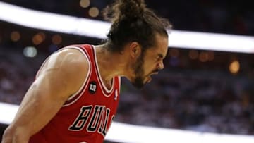Apr 25, 2014; Washington, DC, USA; Chicago Bulls center Joakim Noah (13) yells on the court against the Washington Wizards in the third quarter in game three of the first round of the 2014 NBA Playoffs at Verizon Center. The Bulls won 100-97. Mandatory Credit: Geoff Burke-USA TODAY Sports