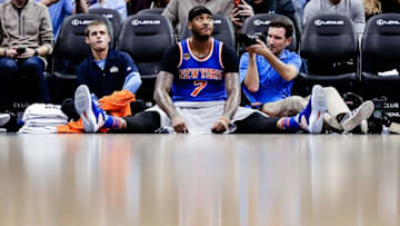 Dec 17, 2016; Denver, CO, USA; New York Knicks forward Carmelo Anthony (7) stretches on the baseline in the fourth quarter of the game against the Denver Nuggets at the Pepsi Center. The Nuggets won 127-114. Mandatory Credit: Isaiah J. Downing-USA TODAY Sports