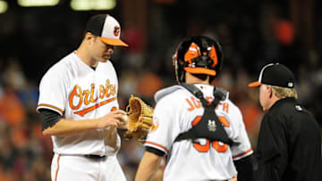 Sep 22, 2016; Baltimore, MD, USA; Baltimore Orioles pitcher Chris Tillman (30) is taken out of the game by manager Buck Showalter (right) in the second inning against the Boston Red Sox at Oriole Park at Camden Yards. Mandatory Credit: Evan Habeeb-USA TODAY Sports