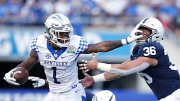 ORLANDO, FL - JANUARY 01: Lynn Bowden Jr. #1 of the Kentucky Wildcats runs for a first down after catching a pass against Jan Johnson #36 of the Penn State Nittany Lions in the third quarter of the VRBO Citrus Bowl at Camping World Stadium on January 1, 2019 in Orlando, Florida. (Photo by Joe Robbins/Getty Images)