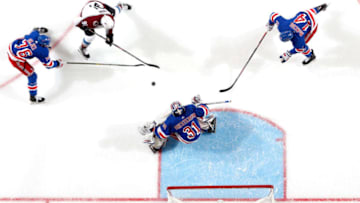 NEW YORK, NY - JANUARY 07: Igor Shesterkin #31 of the New York Rangers tends the net as Brady Skjei #76 and Gregg McKegg #14 defend against Nazem Kadri #91 of the Colorado Avalanche at Madison Square Garden on January 07, 2019 in New York City. (Photo by Jared Silber/NHLI via Getty Images)