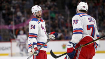 DENVER, COLORADO - JANUARY 04: Adam McQuaid #54 and Brady Skjei #76 of the New York Rangers confer before a faceoff against the Colorado Avalanche in the third period at the Pepsi Center on January 04, 2019 in Denver, Colorado. (Photo by Matthew Stockman/Getty Images)