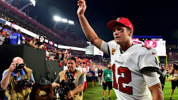 TAMPA, FLORIDA - SEPTEMBER 09: Tom Brady #12 of the Tampa Bay Buccaneers waves to fans after defeating the Dallas Cowboys 31-29 at Raymond James Stadium on September 09, 2021 in Tampa, Florida. (Photo by Julio Aguilar/Getty Images)
