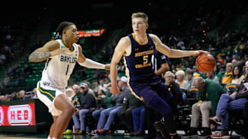 Nov 14, 2022; Waco, Texas, USA; Northern Colorado Bears guard Dalton Knecht (5) dribbles against Baylor Bears guard Keyonte George (1) during the first half at Ferrell Center. Mandatory Credit: Chris Jones-USA TODAY Sports