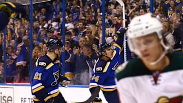 Oct 13, 2016; St. Louis, MO, USA; St. Louis Blues right wing Nail Yakupov (64) celebrates with Patrik Berglund (21) after scoring a goal against Minnesota Wild during the second period at Scottrade Center. Mandatory Credit: Billy Hurst-USA TODAY Sports