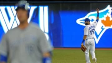 May 29, 2014; Toronto, Ontario, CAN; Toronto Blue Jays right fielder Jose Bautista gestures after throwing out Kansas City Royals designated hitter Billy Butler from a ball hit into right field in the ninth inning of the Royals 8-6 win at Rogers Centre. Mandatory Credit: Dan Hamilton-USA TODAY Sports