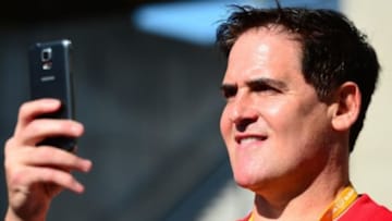 May 25, 2014; Indianapolis, IN, USA; Mark Cuban walks the red carpet prior to the 2014 Indianapolis 500 at Indianapolis Motor Speedway. Mandatory Credit: Andrew Weber-USA TODAY Sports