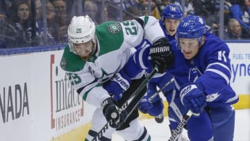 TORONTO, ON - MARCH 14: Toronto Maple Leafs center Zach Hyman (11) goes after the puck and comes up against Dallas Stars defenseman Greg Pateryn (29). Toronto Maple Leafs VS Dallas Stars during 1st period action in NHL regular season play at the Air Canada Centre. Toronto Star/Rick Madonik (Rick Madonik/Toronto Star via Getty Images)