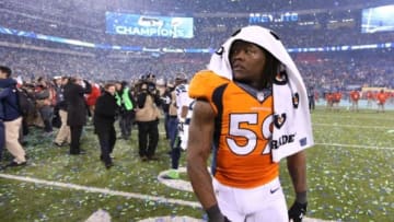 Feb 2, 2014; East Rutherford, NJ, USA; Denver Broncos linebacker Danny Trevathan (59) walks off the field after losing the Super Bowl against the Seattle Seahawks at MetLife Stadium. Seattle Seahawks won 43-8. Mandatory Credit: Matthew Emmons-USA TODAY Sports