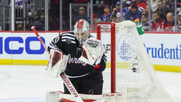 New Jersey Devils goaltender Nico Daws (50) makes a save against the New York Islanders during the third period at Prudential Center. Mandatory Credit: Ed Mulholland-USA TODAY Sports