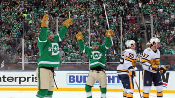 DALLAS, TEXAS - JANUARY 01: Blake Comeau #15 and Andrew Cogliano #11 of the Dallas Stars celebrate Comeau's second-period goal against the Nashville Predators at the Cotton Bowl on January 01, 2020 in Dallas, Texas. (Photo by Richard Rodriguez/Getty Images)